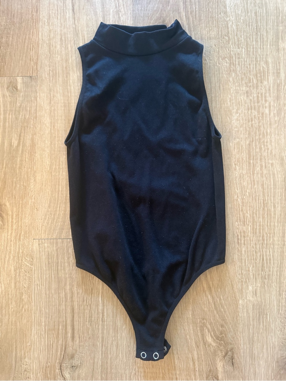 Women’s Black Sleeveless Mock Neck One-Piece Bodysuit